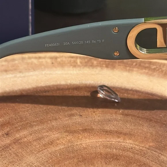 Fendi grayish green 
Sunglasses with Gold Accents - Picture 7 of 9